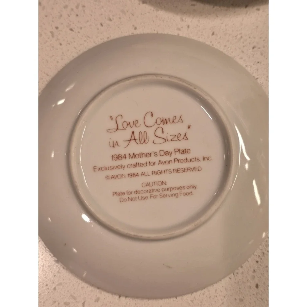 Set of 8 Avon Collectable Plates 1980s